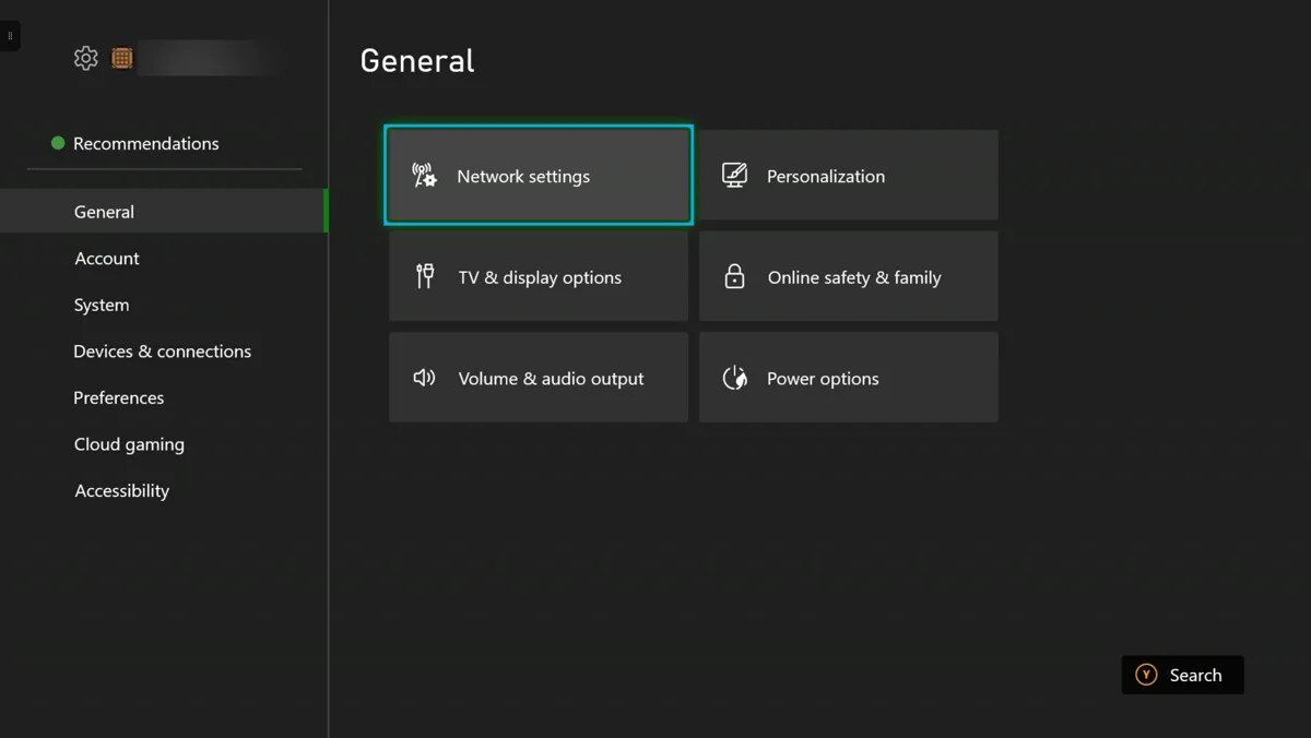 The Xbox Settings screen on the General section. Six tiles are shown: Network settings, Personalization, TV and display options, Online safety and family, Volume and audio output, and Power options. Network settings is highlighted.