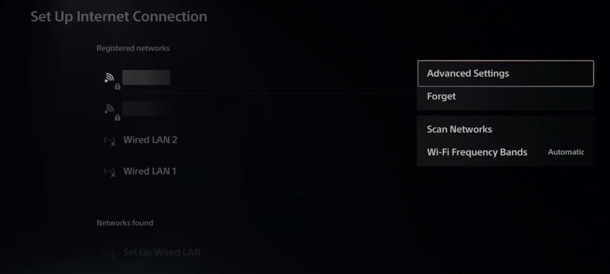 The same PS5 screen with a menu open on the right offering Advanced Settings, Forget, Scan Networks, and Wi-Fi Frequency Bands set to Automatic. Advanced Settings is highlighted. The Wi-Fi network names are blurred out.